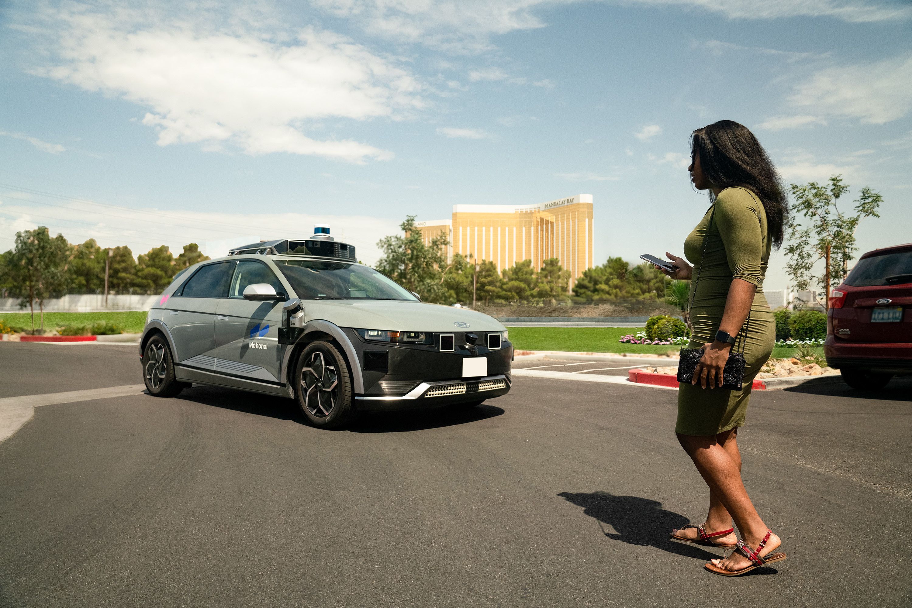 Motional's IONIQ 5 robotaxi picking up a rider in Las Vegas