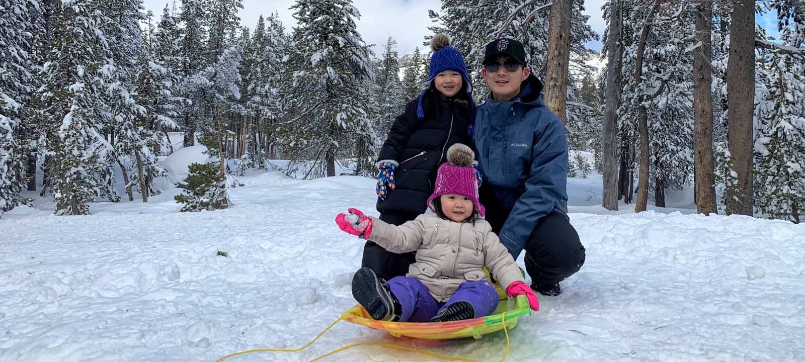 Seungho sledding with his kids.