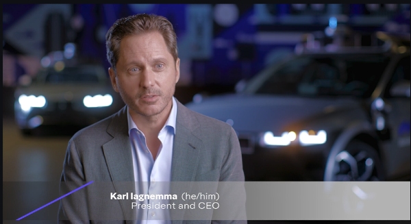 Karl Iagnemma, Motional's CEO, with IONIQ 5 robotaxis behind him