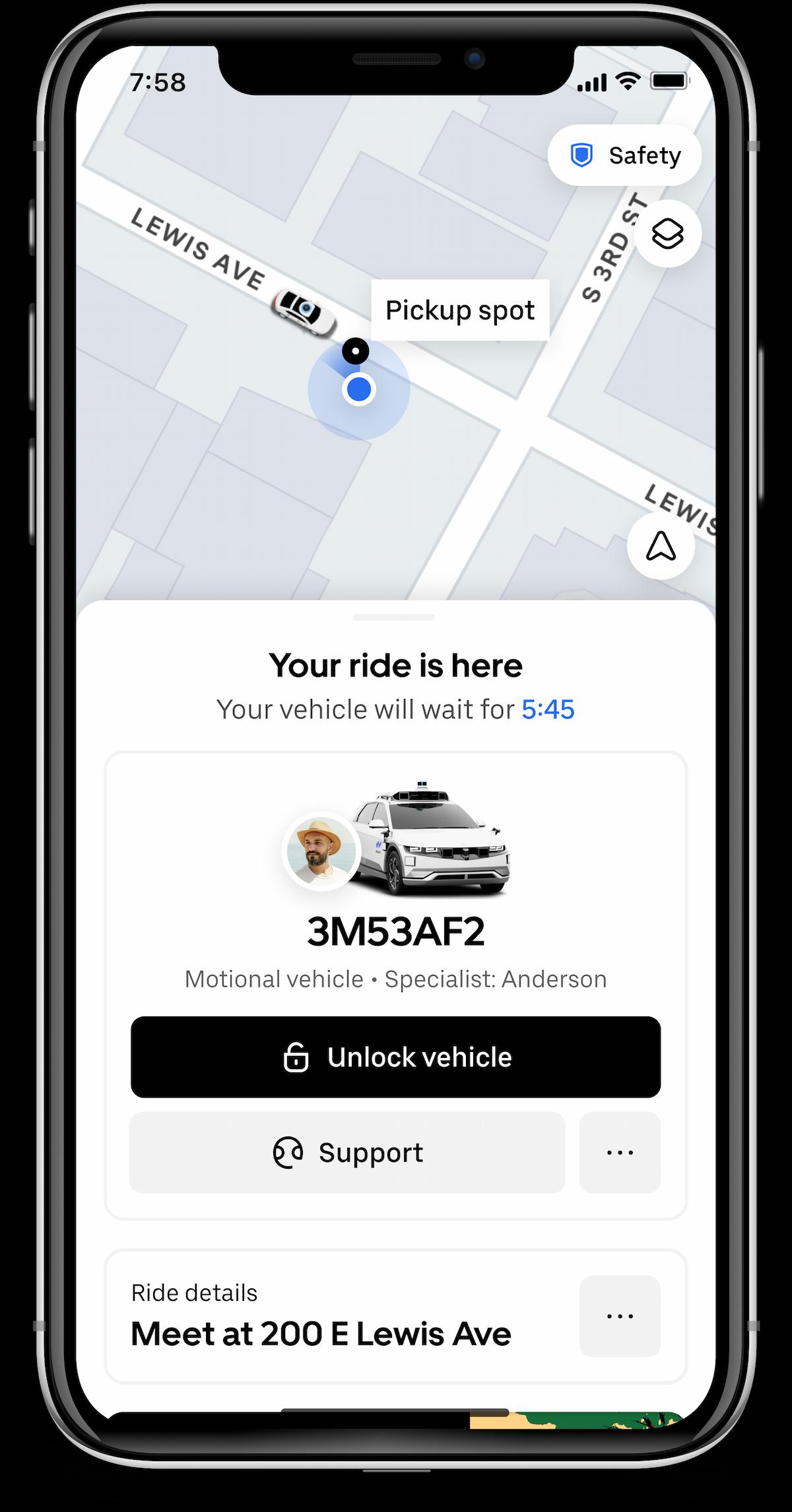 A "Your ride is here" notification and Unlock button for the Motional robotaxi in the Uber app